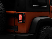 Load image into Gallery viewer, Raxiom 07-18 Jeep Wrangler JK LED Tail Lights- Black Housing (Smoked Lens) Tail Lights Raxiom