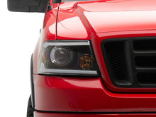 Load image into Gallery viewer, Raxiom 04-08 Ford F-150 Axial Series Projector Headlights w/ SEQL LED Bar- Blk Housing (Clear Lens) Headlights Raxiom