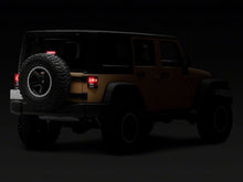 Load image into Gallery viewer, Raxiom 07-18 Jeep Wrangler JK Axial Series Hyper Flash LED Third Brake Light- Smoked Brake Lights Raxiom
