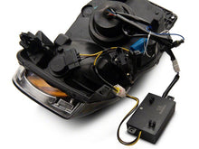 Load image into Gallery viewer, Raxiom 02-05 Dodge RAM 1500 LED Projector Headlights w/ SEQL LED Bar- Blk Housing (Clear Lens) Headlights Raxiom