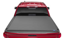 Load image into Gallery viewer, Lund 05-17 Nissan Frontier (5ft. Bed w/o Utility TRack) Genesis Elite Roll Up Tonneau Cover - Black LUND