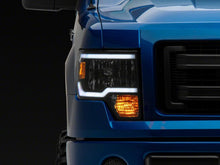 Load image into Gallery viewer, Raxiom 09-14 Ford F-150 Axial Series Headlight w/ SEQL LED Bar- Blk Housing (Clear Lens) Light Bars & Cubes Raxiom