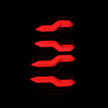 Load image into Gallery viewer, AlphaRex 09-18 Dodge Ram Luxx-Series LED Tail Lights Black w/ Activation Light & Sequential Signal AlphaRex