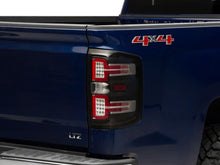 Load image into Gallery viewer, Raxiom 14-18 Chevrolet Silverado 1500 LED Taillights w/ SEQL Turn Signals- Blk Housing (Clear Lens) Lights Corner Raxiom