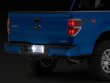 Load image into Gallery viewer, Raxiom 97-14 Ford F150 Axial Series LED License Plate Lamps | T584721