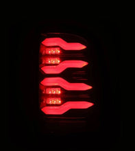 Load image into Gallery viewer, AlphaRex 09-18 Dodge RAM LUXX-Series LED Taillights Black Red w/Actv Light & SS AlphaRex