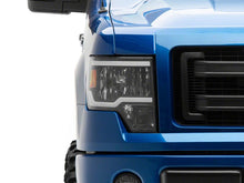 Load image into Gallery viewer, Raxiom 09-14 Ford F-150 Axial Series Headlight w/ SEQL LED Bar- Blk Housing (Clear Lens) Light Bars & Cubes Raxiom