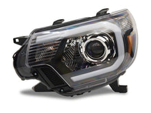 Load image into Gallery viewer, Raxiom 12-15 Toyota Tacoma Axial Projector Headlights w/ SEQL LED Bar- Blk Housing (Clear Lens) Headlights Raxiom