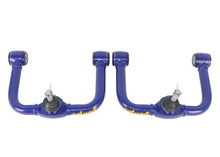 Load image into Gallery viewer, Superpro 05-21 Nissan Frontier - Fixed Offset Upper Control Arm Set - Camber/Caster Correction Superpro