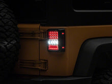 Load image into Gallery viewer, Raxiom 07-18 Jeep Wrangler JK Axial Series Lux LED Tail Lights- Blk Housing (Clear Lens) Tail Lights Raxiom