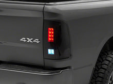 Load image into Gallery viewer, Raxiom 09-18 Dodge RAM 1500/2500/3500 Axial Series LED Tail Lights- Blk Housing (Smoked Lens) Tail Lights Raxiom