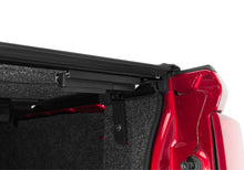 Load image into Gallery viewer, UnderCover 09-23 Dodge Ram 76.8in Fusion Bed Cover - Black Undercover