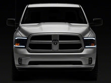 Load image into Gallery viewer, Raxiom 09-18 Dodge RAM 1500/2500/3500 Axial Series Headlights w/ LED Bar- Blk Housing (Clear Lens) Headlights Raxiom
