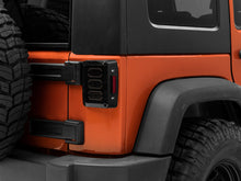 Load image into Gallery viewer, Raxiom 07-18 Jeep Wrangler JK LED Tail Lights- Black Housing (Smoked Lens) Tail Lights Raxiom