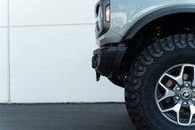 Load image into Gallery viewer, DV8 Offroad 21-23 Ford Bronco Capable Bumper Front License Plate Mount License Plate Relocation DV8 Offroad