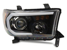 Load image into Gallery viewer, Raxiom 07-13 Toyota Tundra Axial Projector Headlights w/ SEQL LED Bar- Blk Housing (Clear Lens) Headlights Raxiom
