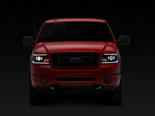 Load image into Gallery viewer, Raxiom 04-08 Ford F-150 Axial Series Projector Headlights w/ SEQL LED Bar- Blk Housing (Clear Lens) Headlights Raxiom