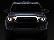 Load image into Gallery viewer, Raxiom 12-15 Toyota Tacoma Axial Series Projector Headlights w/ LED Bar- Blk Housing (Clear Lens) Headlights Raxiom