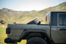 Load image into Gallery viewer, DV8 Offroad 2020+ Jeep Gladiator JT Adjustable In-Bed Tire Carrier