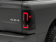 Load image into Gallery viewer, Raxiom 09-18 Dodge RAM 1500/2500/3500 Axial Series LED Tail Lights- Blk Housing (Smoked Lens) Tail Lights Raxiom