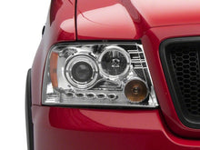 Load image into Gallery viewer, Raxiom 04-08 Ford F-150 Dual LED Halo Projector Headlights- Chrome Housing (Clear Lens) Headlights Raxiom