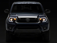 Load image into Gallery viewer, Raxiom 12-15 Toyota Tacoma Axial Projector Headlights w/ SEQL LED Bar- Blk Housing (Clear Lens) Headlights Raxiom