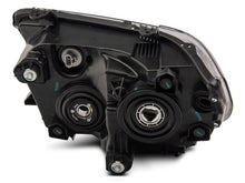 Load image into Gallery viewer, Raxiom 07-13 Toyota Tundra Axial Projector Headlights w/ SEQL LED Bar- Blk Housing (Clear Lens) Headlights Raxiom