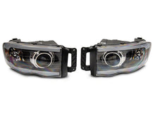 Load image into Gallery viewer, Raxiom 02-05 Dodge RAM 1500/2500/3500 Axial LED Projector Headlights- Blk Housing (Clear Lens) Headlights Raxiom