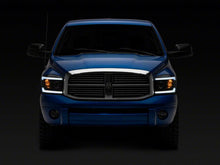 Load image into Gallery viewer, Raxiom 06-09 Dodge RAM 1500/2500/3500 Axial Headlights w/ SEQL LED Bar- Blk Housing (Clear Lens) Headlights Raxiom