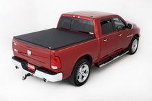 Load image into Gallery viewer, Lund 02-17 Dodge Ram 1500 (5.5ft. Bed) Genesis Elite Tri-Fold Tonneau Cover - Black LUND
