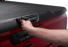 Load image into Gallery viewer, UnderCover 2022 Nissan Frontier 5ft Elite Bed Cover - Black Textured Bed Covers - Hinged Undercover