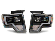 Load image into Gallery viewer, Raxiom 09-14 Ford F-150 Axial G4 Light Bar Switchback Projector Headlights- Blk Housing (Clear Lens) Headlights Raxiom