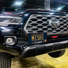 Load image into Gallery viewer, Mishimoto 16-23 Toyota Tacoma License Plate Relocation Kit Mishimoto