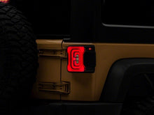 Load image into Gallery viewer, Raxiom 07-18 Jeep Wrangler JK Axial Series Carver LED Tail Lights- Blk Housing (Smoked Lens) Tail Lights Raxiom