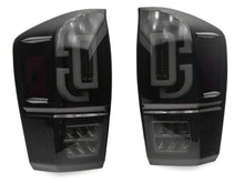 Load image into Gallery viewer, Raxiom 16-23 Toyota Tacoma XW Series Sequential LED Tail Lights- Black Housing/ Smoked Lens | TT30330