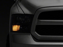 Load image into Gallery viewer, Raxiom 09-18 Dodge RAM 1500 Axial Series Euro Style Headlights w/ Dual Bulb Blk Housing (Clear Lens) Headlights Raxiom