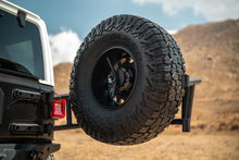 Load image into Gallery viewer, DV8 18-25 Jeep Wrangler JL Body Mounted Tire Carrier