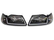 Load image into Gallery viewer, Raxiom 99-04 Ford Mustang Axial Series Headlights w/ Sequential LED Bar- Blk Housing (Clear Lens) Headlights Raxiom