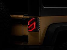 Load image into Gallery viewer, Raxiom 07-18 Jeep Wrangler JK Axial Series Trident LED Tail Lights- Blk Housing (Smoked Lens) Tail Lights Raxiom