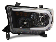 Load image into Gallery viewer, Raxiom 07-13 Toyota Tundra Axial Series Headlights w/ SEQL LED Bar- Blk Housing (Clear Lens) Headlights Raxiom