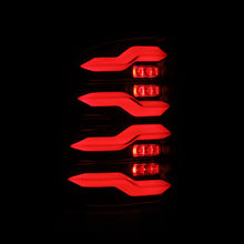 Load image into Gallery viewer, AlphaRex 09-18 Dodge Ram Luxx-Series LED Tail Lights Alpha-Black w/ Activation Light & Seq. Signal AlphaRex