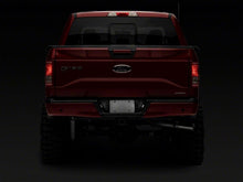 Load image into Gallery viewer, Raxiom 07-14 Ford F-150 Axial Series LED License Plate Lamps- Smoked Bulbs Raxiom