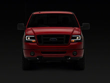 Load image into Gallery viewer, Raxiom 04-08 Ford F-150 Axial Series Projector Headlights- Black Housing- Clear Lens | T569352