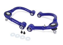 Load image into Gallery viewer, Superpro 05-23 Toyota Tacoma 4WD Front Upper Fixed Offset Control Arm Set | TRC6471