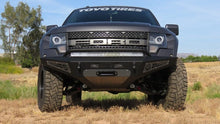 Load image into Gallery viewer, Addictive Desert Designs ADDF017275050103 Addictive Desert Designs 10-14 Ford F-150 Raptor HoneyBadger Front Bumper w/ Winch Mount