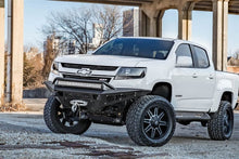 Load image into Gallery viewer, Addictive Desert Designs ADDF357382720103 Addictive Desert Designs 15-18 Chevy Colorado HoneyBadger Front Bumper w/ Winch Mount