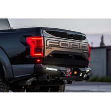 Load image into Gallery viewer, Addictive Desert Designs Bumpers - Steel Addictive Desert Designs 17-18 Ford F-150 Raptor HoneyBadger Rear Bumper w/ 10in SR LED Mounts