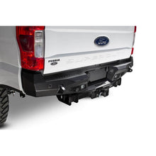 Load image into Gallery viewer, Addictive Desert Designs Bumpers - Steel Addictive Desert Designs 17-18 Ford F-250 Raptor Stealth Fighter Rear Bumper w/ Backup Sensor Cutout