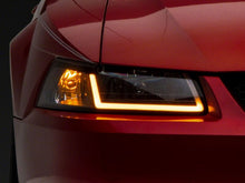 Load image into Gallery viewer, Raxiom 99-04 Ford Mustang Axial Series Headlights w/ Sequential LED Bar- Blk Housing (Clear Lens) Headlights Raxiom