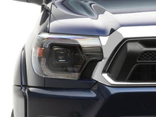 Load image into Gallery viewer, Raxiom 12-15 Toyota Tacoma Axial Series Switchback Projector Headlights- Black Housing- Clear Lens | TT23359